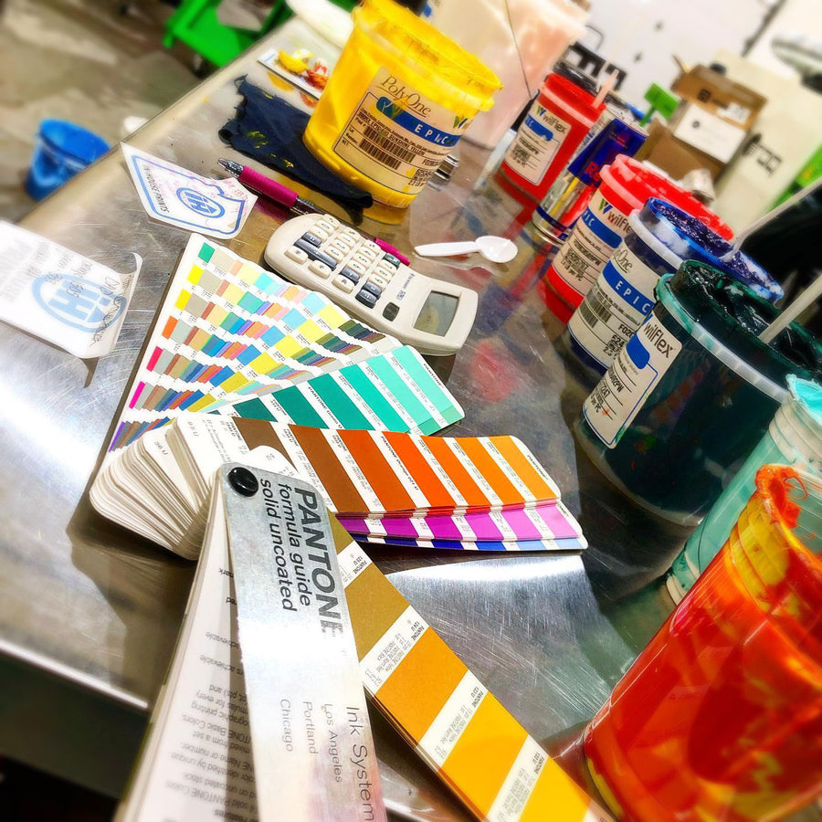 Custom screen printing embroidery and branded merchandise production